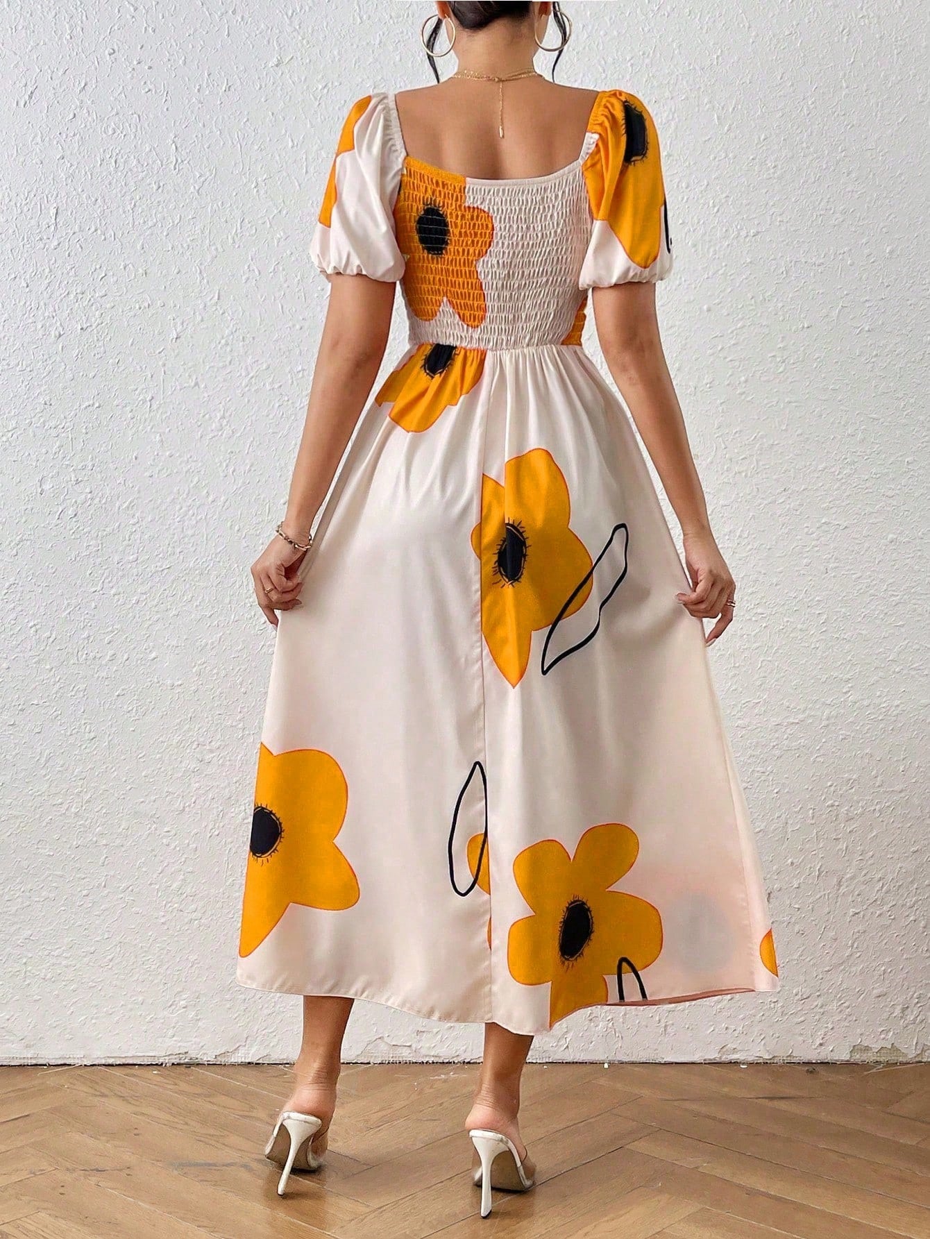 Vestido Floral Elegante com Manga Bufante e Fenda Lateral